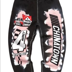 CHINATOWN MARKET RACING TIE DYE SWEATPANTS PINK AND RED RACE CAR